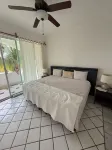 Surf and Chill: Beachfront 2-bed condo with pools, gym, steps to surf breaks