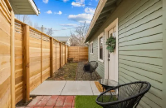 Cozy cottage in North End on tree-lined street.