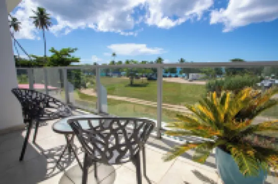 Beachfront in gated community with patio,  balcony, pool, close to all in Rincón