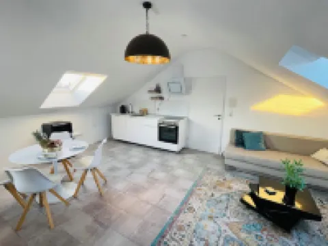 Bright, spacious attic apartment.