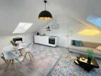 Bright, spacious attic apartment.