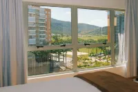 Atrium Studios by Xtay – Estúdios Modernos, Bem Localizados e a 9Min da Arena Opus - parking