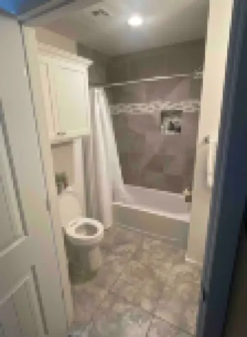 Perfect Oasis. NEW Home Away from Home with COVERED PARKING-Close to everything