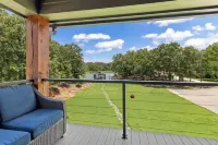 Richland Chambers Lakefront 2-story home with boat dock and pavilions.