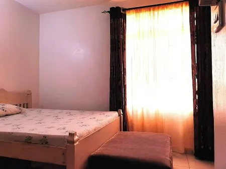 Centrally located 2-bedroom apartment/WiFi & basement parking in vibrant Mombasa