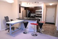 10 minutes to the LRT station and Rec Centre! Family-sized condo with patio.