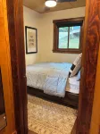 3-bedroom modern mid century cabin! Hot tub, fire pit and lake front
