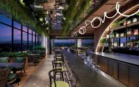 ARTOTEL Living World Kota Wisata - bar