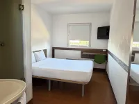 Hotel Hi! Zapopan Отели рядом с достопримечательностью «Культурный и конгресс-центр PALCCO»