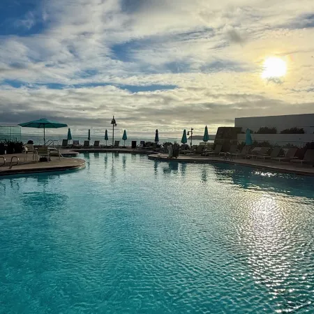 Beach and city views in condo with backyard access to beach and walkable town.