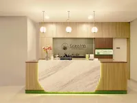 Grass Inn Hotel Solo Hotels in Grogol