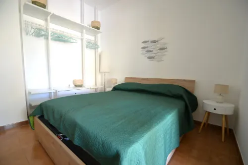 Villetta Gianira con giardino ombreggiato e climatizzatore Pt58