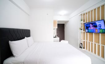 New Studio Apartment with Strategic Location at Suncity Residence By Travelio