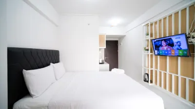 New Studio Apartment with Strategic Location at Suncity Residence By Travelio