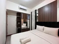 Warm and Cozy 2BR Vida View Makassar Apartment By Travelio