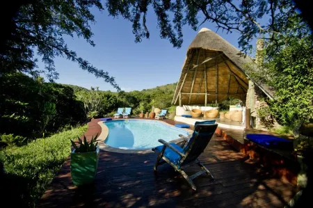 Sibuya Game Reserve and Lodge Отели в г. Порт-Альфред