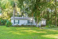 Riverfront Home with Boat Dock