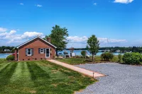 Waterfront retreat with dock, kayaks, and outdoor living. Bring the boat!