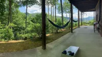 Private Cabin with  Mountain Views, Fire Pit, Wraparound Deck, and Game Room!