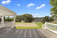 Stunning Lakefront Retreat with Jacuzzi and Unobstructed Mountain Views