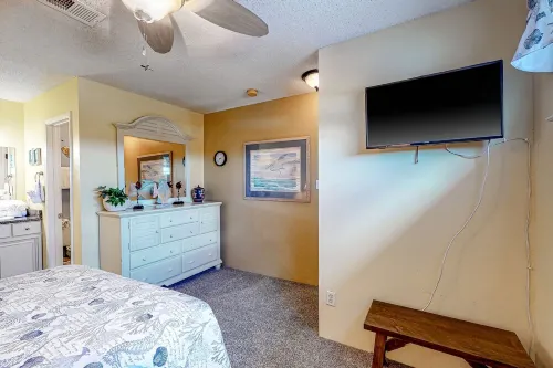 Cozy Beach Condo with Private Beach, heated pool, hot tub, and More.