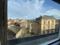 Large elegant apartment in the heart of Epernay. Quiet top floor with lovely view.