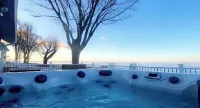 Enjoy Beautiful Sunsets at this Lake House w a HOT TUB, Boat Garage and Game Rm