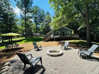NEWLY RENOVATED! Large sandy beach & swim area. Cute 3 bedroom lake house