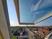 Cozy attic studio Norddeich panoramic window with sea view beach 50 meters