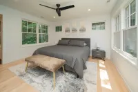 AMAZING NEWER HOME WITH LAKE VIEWS, steps away from shops and restaurants. Hotels near Roan & Black