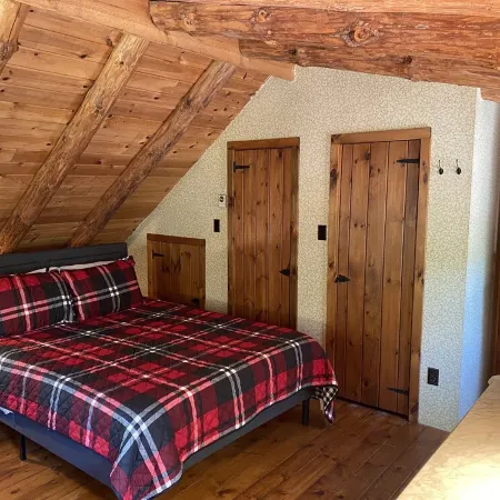 The perfect ADK log cabin getaway on 4 acres and 5 min. to town!