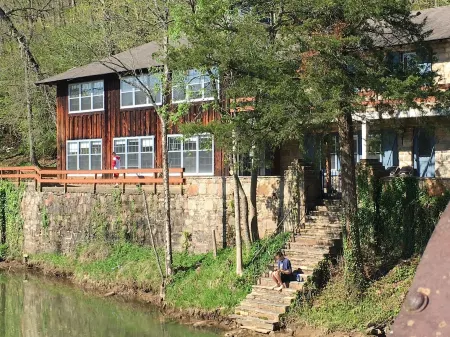 Historic Limestone House in park setting in Ozarks