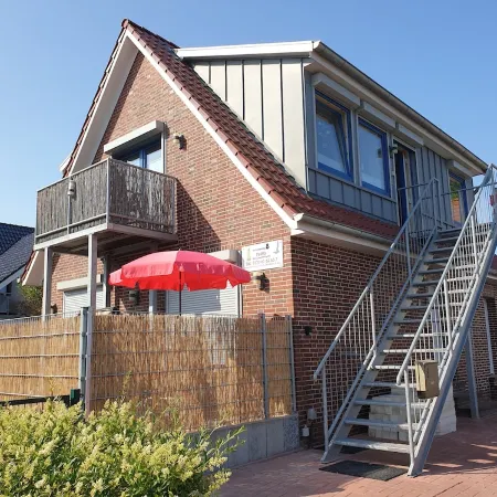 Apartment lighthouse at the sandy beach-balcony-2 double-bedroom-balcony-dogs on request