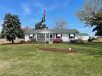 Quaint costal farm cottage, on a working farm, just mere miles from beaches!