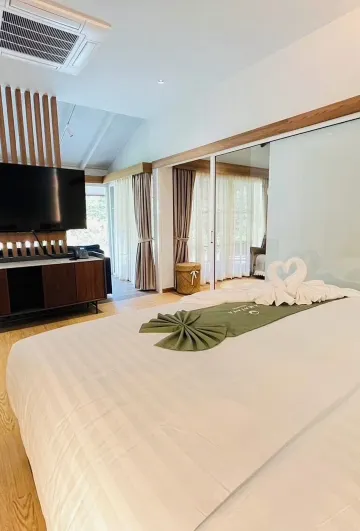 ห้องแกรนด์ พร้อมระเบียง วิวสวน