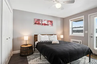Water-view condo with shared pools/hot tubs, WiFi, washer/dryer, & central AC