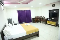 Kalyan Tourist Home Hotels in Pudussery West