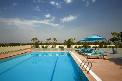 Courtyard Bilaspur Hotels near Shiv Mandir Ghasidev Chowk