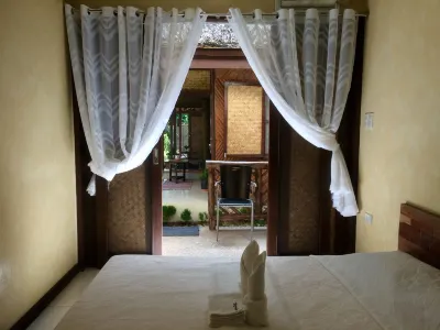 Le Cou de Tou Village Resort Hôtels à : Roxas