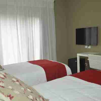 Magno Suites Rooms