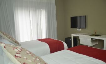 Magno Suites