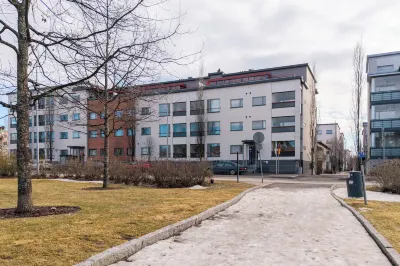 Homelike 1BR Apt. with Sauna & Parking Hotels in 