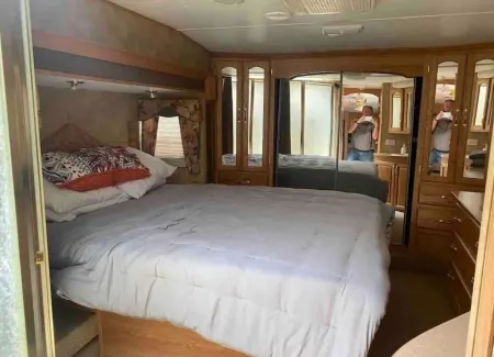Lake Shore Queen Bed Trailer, Tiki Torches, & Tent Space for Extra Guest