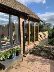 Boutique garden apartment with decking and views