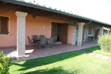 Apartments with pool and garden a short distance from the beach.