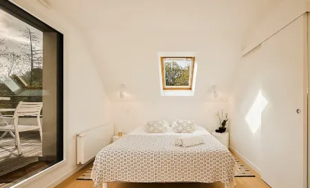 In a green setting close to the ocean