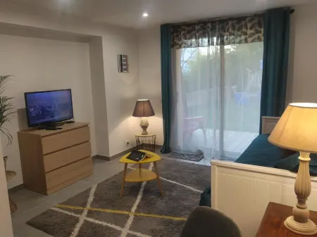 Beachfront studio with pool.