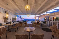 Flaskos Suites - servizio colazione