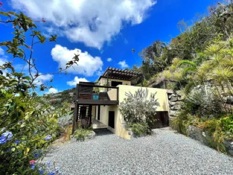 Big Views Over the Private Pool from this Simple Modern Getaway Hotels in 