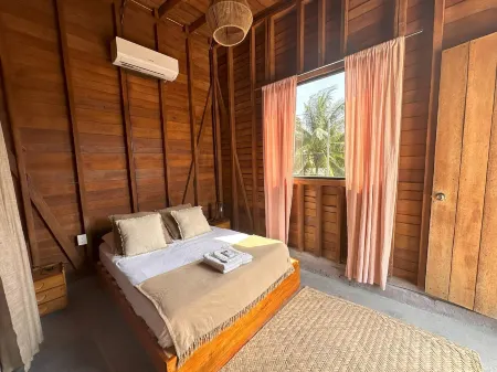 Mapache Hostel Отели рядом с достопримечательностью «Columpios Casa Punta Cocos»